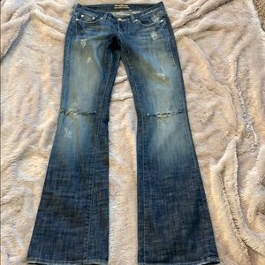 Bebe knee-ripped blue jeans